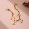 Golden Tone Stainless Steel Multi-Charm Bracelet with Cross and Sun Pendants for Women