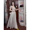 Retro gentle wind polka dot small flying sleeve dress is beautiful and beautiful, waist cold, unique and chic skirt