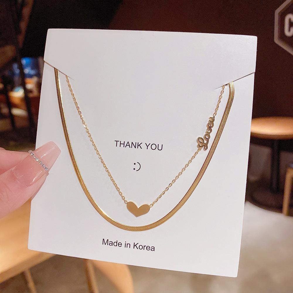 Minimalist Clavicle Necklace: Japanese & Korean Style, Luxurious Real Gold-Plated Titanium Steel Pendant for Women