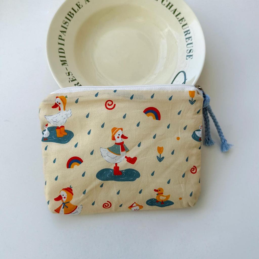 Adorable Blue Cartoon Makeup Bag: Mini Pure Cotton Coin and Earphone Pouch, Lipstick Carrier, Portable Storage.