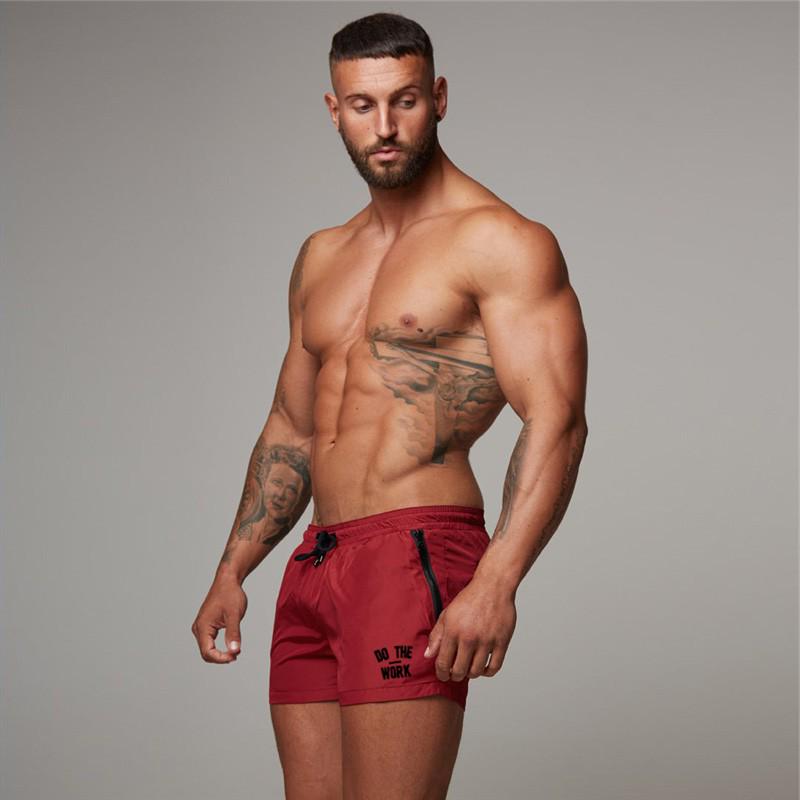 Muscleguys Letní novinka Workout Mens Beach Board Shorts Slim Fitness běžecké šortky rychleschnoucí