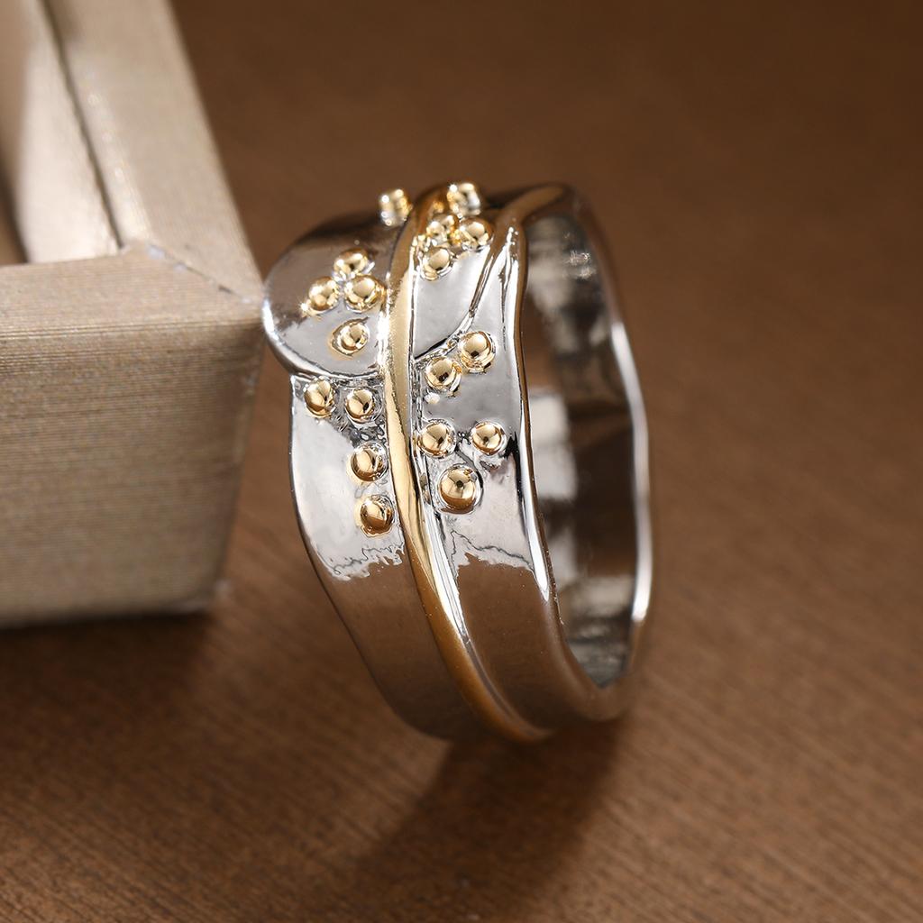 geometric double-color ring in copper material for ladies' jewelry. Suitable for formal events or daily wear.