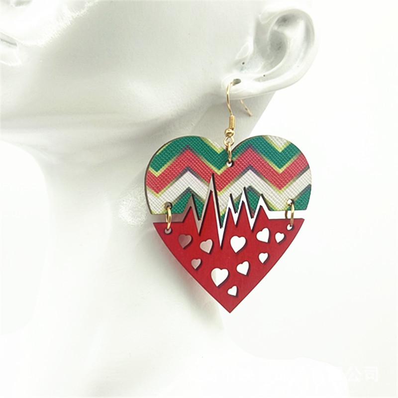 Red Hollow Spliced Creative Christmas Leather Dangle Earrings