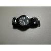 Used Nixon wristwatch, dead battery, black, no parts removed after belt adjustment