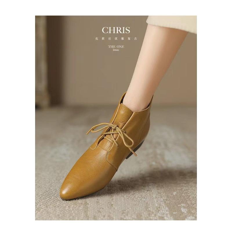 Koreanischer Stil Britischer Stil Innenhöhe zunehmende Schnürung Lässige spitze Zehenpartie Dicke Ferse Nackte Stiefel Modische kurze Stiefel