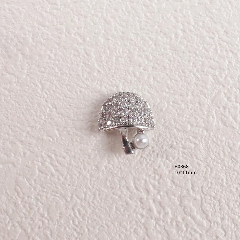 Trendiger Strass- und Zirkon-Nagelschmuck mit diamantbesetzten Metallpailletten