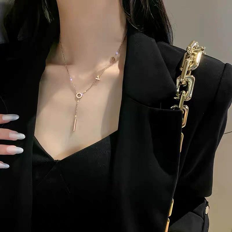 Elegant Korean-Style Titanium Steel Necklace with 'Love' Letter Tassel for Women