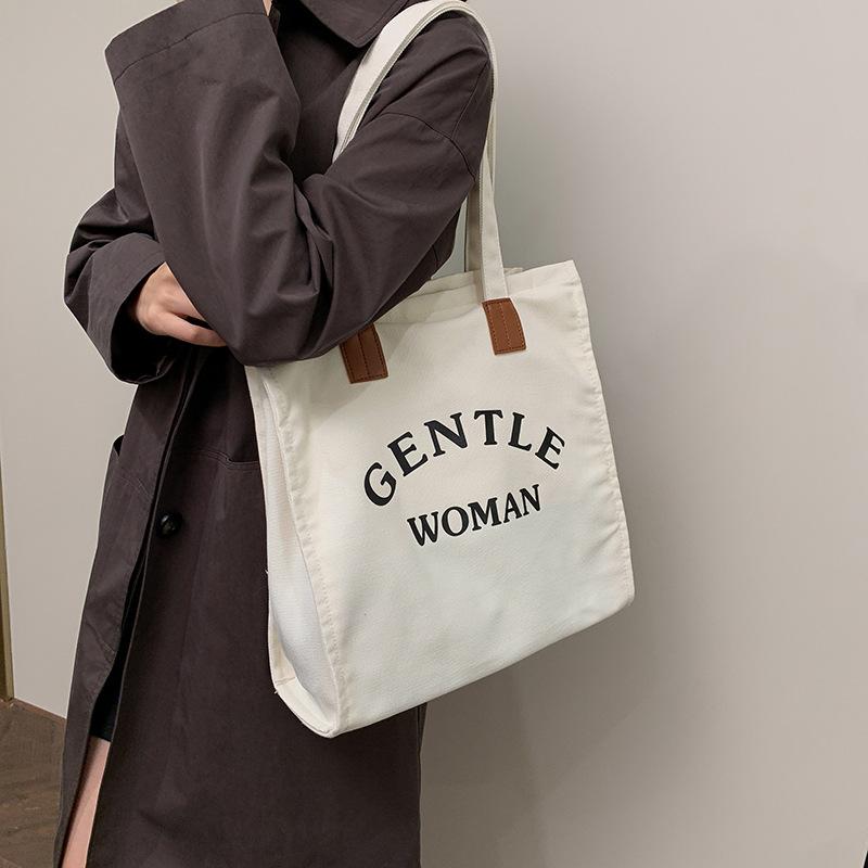 Large capacity canvas bag women's 2025 autumn and winter casual fashion shoulder bag alphabet commuter class tote bag