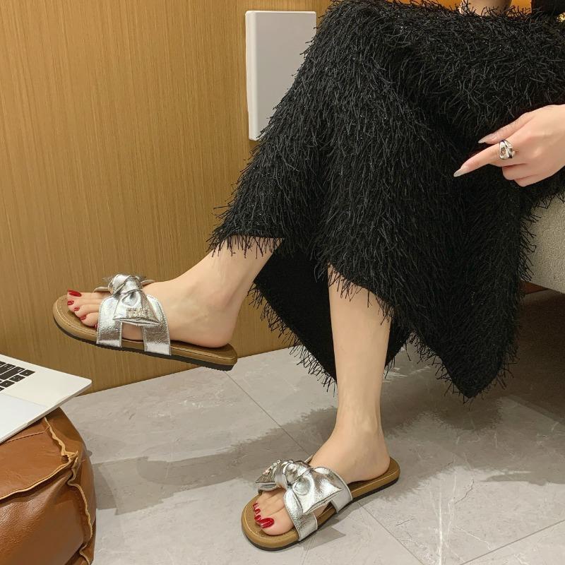 

Slippers women s summer outer wear new flat-bottomed flowers with skirts one-word beach sandals 40 серебряный