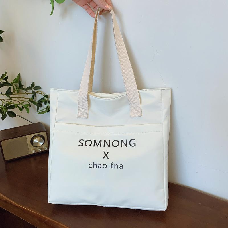 

Vintage 2025 Spring New Fashion Trend Line Letter Printing Women s Trend Crossbody One Shoulder Small Square Bag Tote