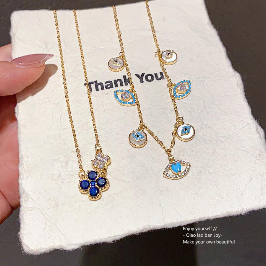 Damen-Anhänger-Halskette in Goldton mit Glücksklee-Motiv und Zirkon-Verzierung