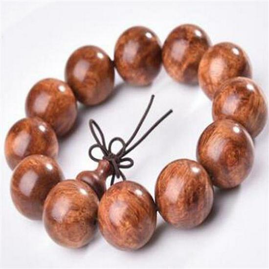 Herren Armband aus rotem Sandelholz mit goldenem Stern Agarholz Buddhistische Gebetsperlen