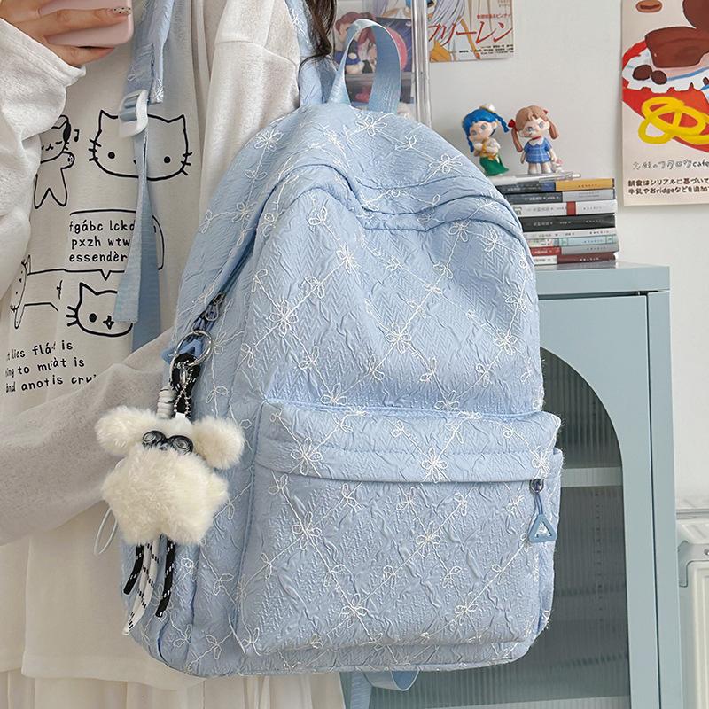 2025 new high-value travel lightweight junior high school student backpack women's large-capacity literary and versatile schoolbag