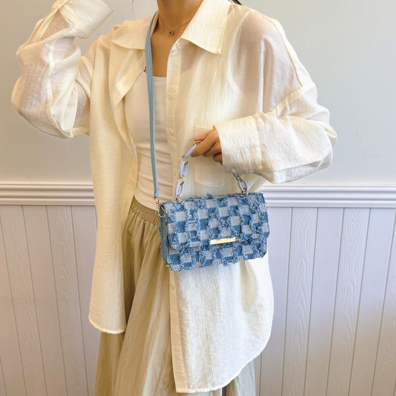 Fashionable Medium-sized Canvas Handbag With Unique Stitching And Tassel Features