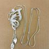 Women's High-End Light Luxury Butterfly Tassel Cross Necklace - Versatile Long Sweater Chain, European & American Autumn/Winter Accessory.