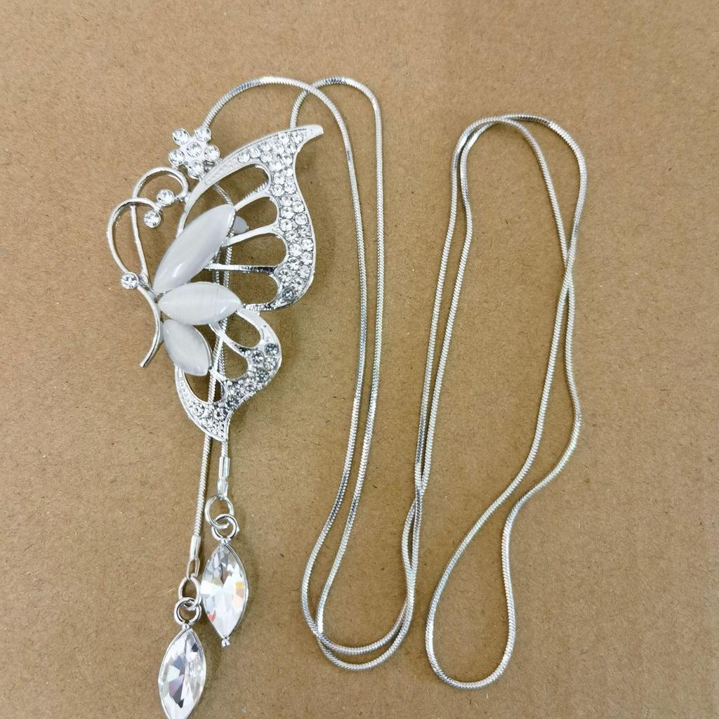 Women's High-End Light Luxury Butterfly Tassel Cross Necklace - Versatile Long Sweater Chain, European & American Autumn/Winter Accessory.