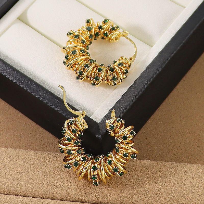 European and American Style Hollow Braided Twist Earrings with Emerald Zircon Wrapped Design Round Ear Hoops Vintage Niche Earrings Emerald