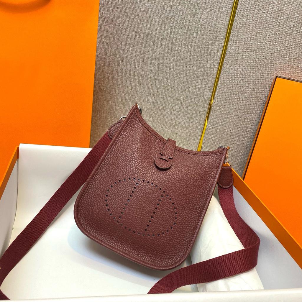 Factory wholesale first layer togo cowhide bucket bag women's bag lychee pattern hollow single shoulder crossbody bag hollow design