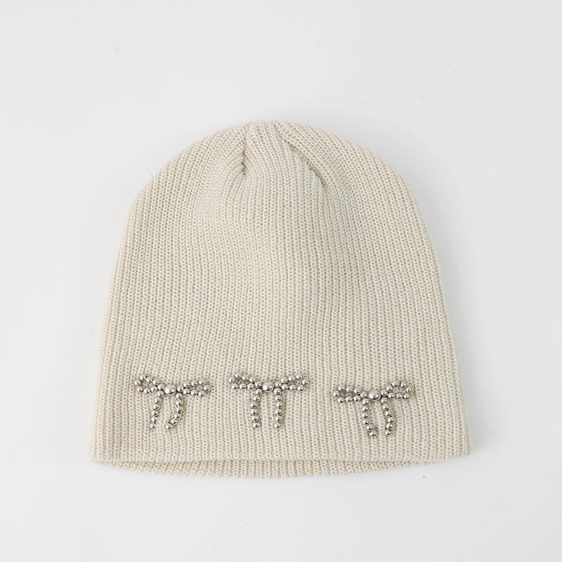 Blogger Pearl Bow Knitted Hat Women's Winter Solid Color Cold-proof and Warm Double-layer Ear Protector Wool Hat