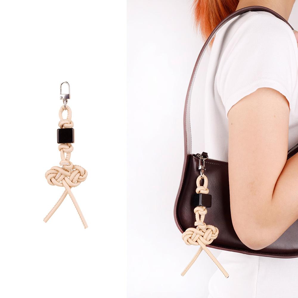 MIU series creative color hand-woven ruyi knot pu leather cord accessories bag pendant keychain