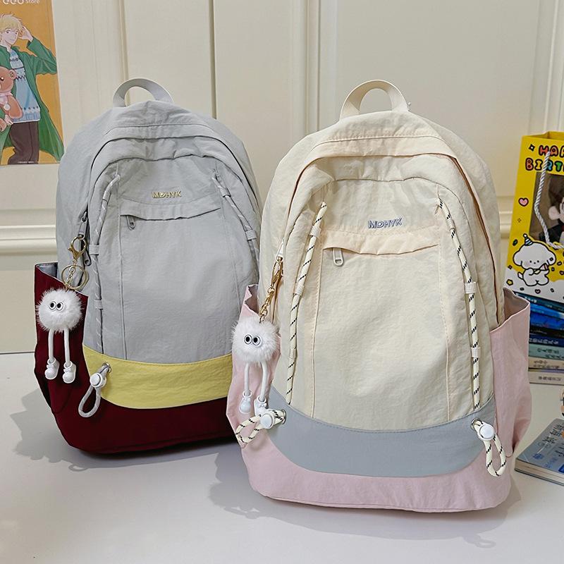 Schultasche einfach koreanisch kontrastierende Farben neue Schultasche leichter Reise-Freizeitrucksack hoher Wert schmutzabweisend große Kapazität Umhängetasche