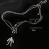 "European & American Double-Layer Love Necklace: Hip-Hop Inspired Long Sweater Chain for Women"