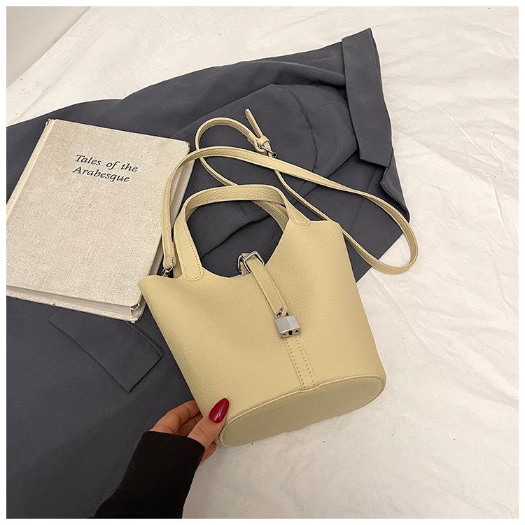 Beliebte tragbare Eimertasche Damen Frühling und Sommer 2025 Neue einfache und lässige Umhängetasche Modische Umhängetasche