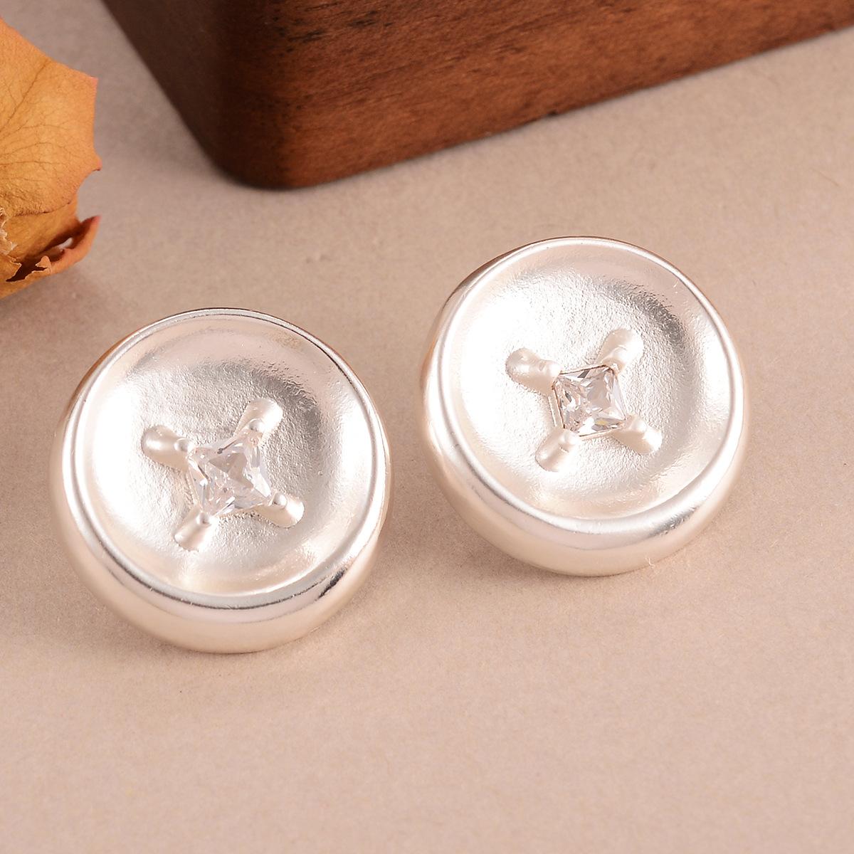 

European and American simple style button zircon earrings color retention retro design sense niche women s stud earrings fashion versatile high sense