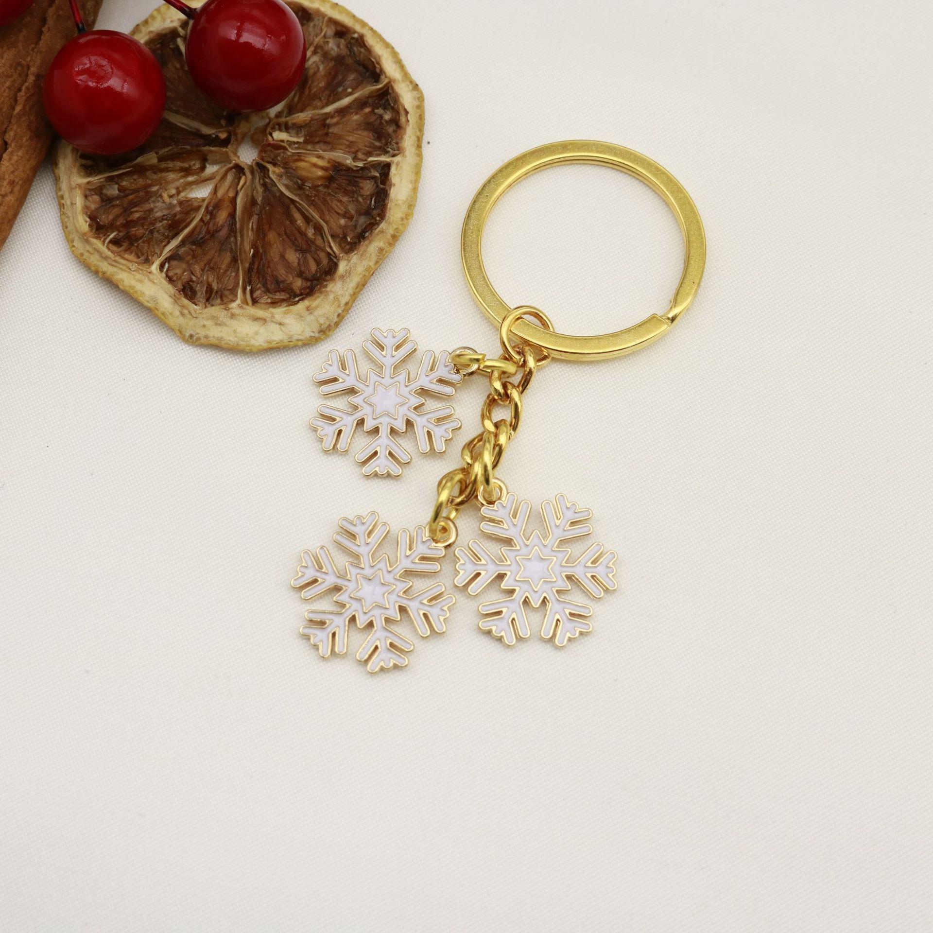 European & American Christmas Snowflake Keychain with Bell Pendant - Creative Alloy Ornament Gift