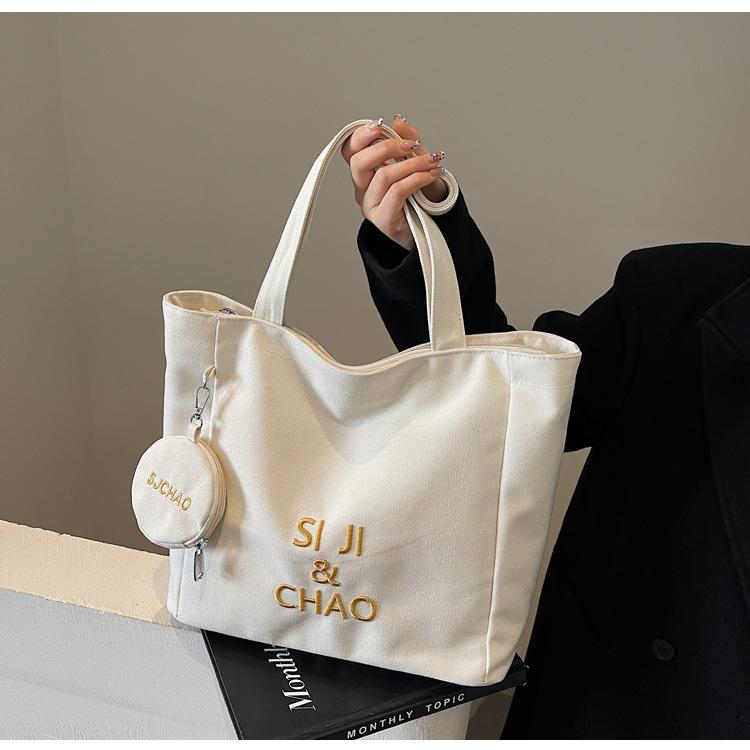 Women's Large-capacity Canvas Bag, Simple Letters, Versatile Commuting Artifact.