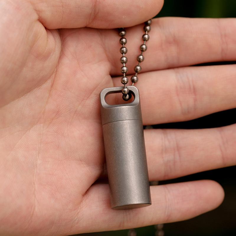 EDC Pockey Mini Voll-Titan-Metall Aufbewahrungsflasche Wasserdicht Schlüsselanhänger Pillendose Box Versiegelt für Zubehör Outdoor Camping