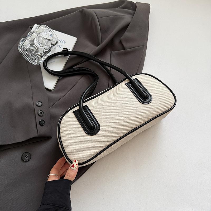 

High value niche personality large capacity portable bowling bag women s 2025 summer new splicing shoulder armpit bag чёрный