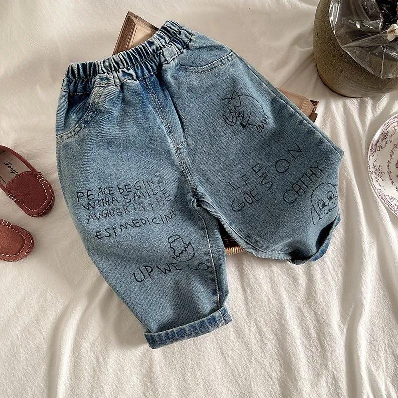 

Embroidered Cartoon Jeans - Stylish Pants 90 синій