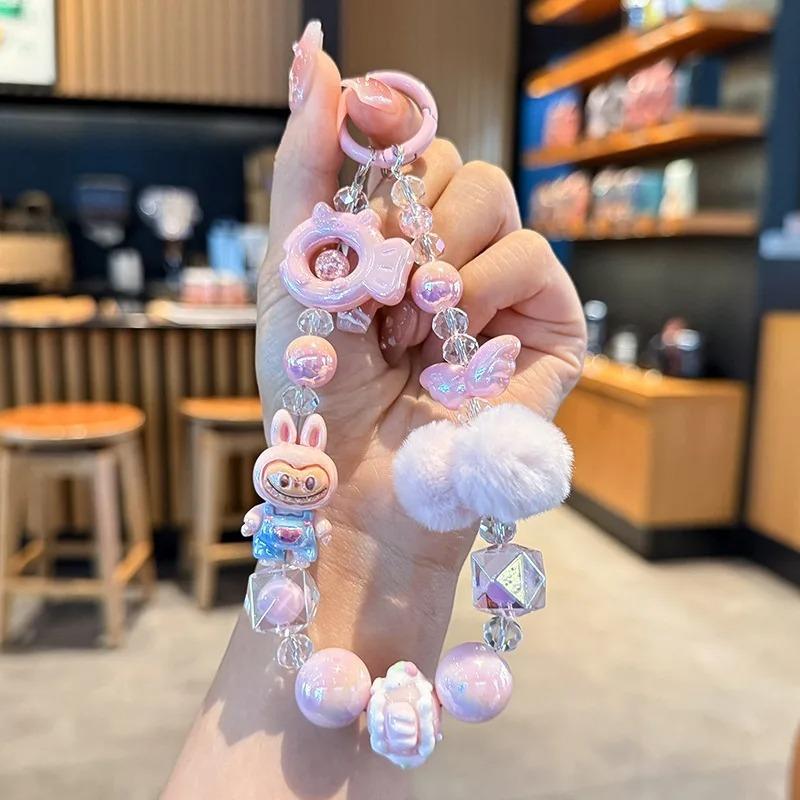 

New Labubu Painted Beads Phone Chain Hairball Keychain Sweet Girl Anti-lost Wrist Strap Bracelet Earphone Case Charm Bag Decor рожевий