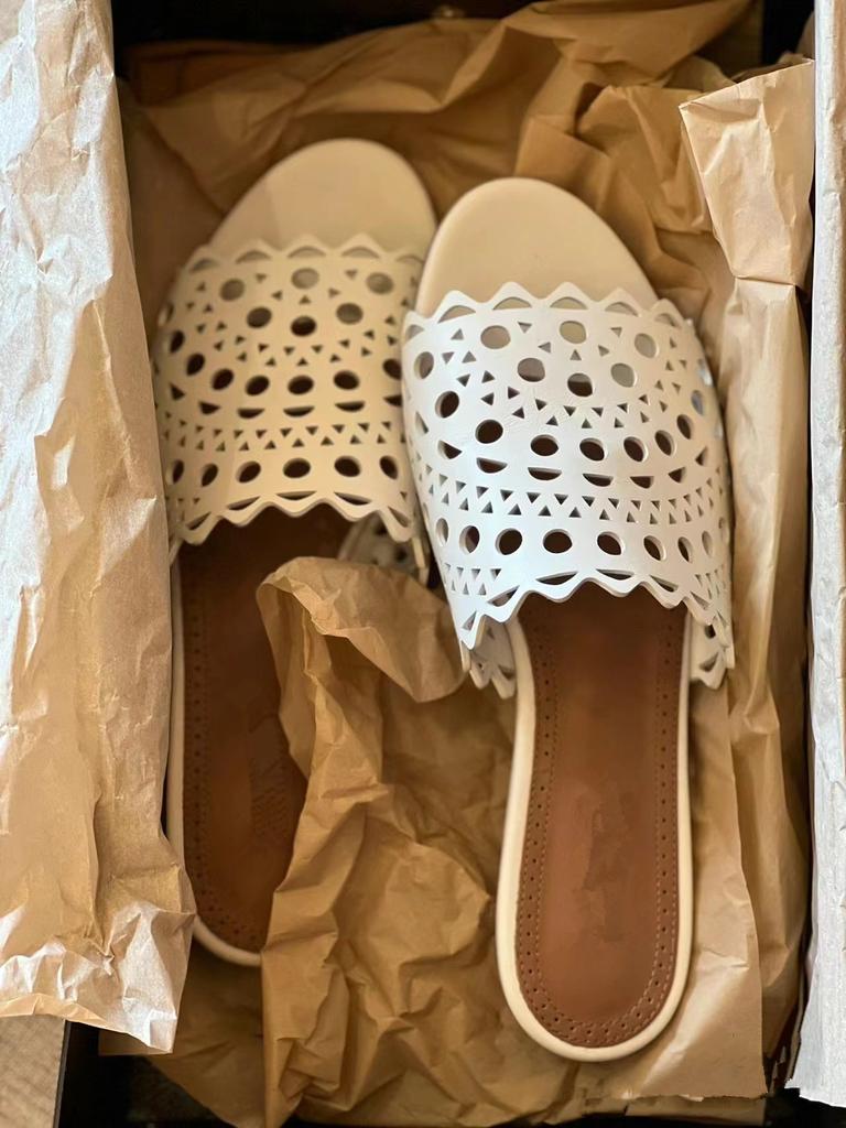 Leather Hollowed-out Laser Engraved Leather One-word Flat-bottomed Cool Slippers Women's Fashion 2025 New Summer Sandals