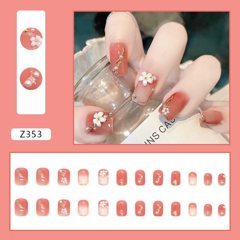 

24 шт. Long Island Iced Tea Nail Art Короткие тонкие трехмерные рельефные камелии Маленькие свежие таблетки для дизайна ногтей Ношение готового ногтя