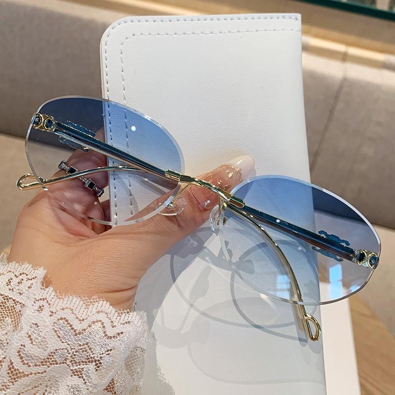 Oval Frame Metal Frameless Uv400 Sunglasses Trendy And High-End Retro Fashion Sun Protection Uv Resistant Glasses For Women