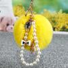 Fashion Pompom Keychain Number 5 Faux Fluffy Crystal Bottle Bow Pearl Chain Women handBag Car Key Chain Ring Keychains Jewelry