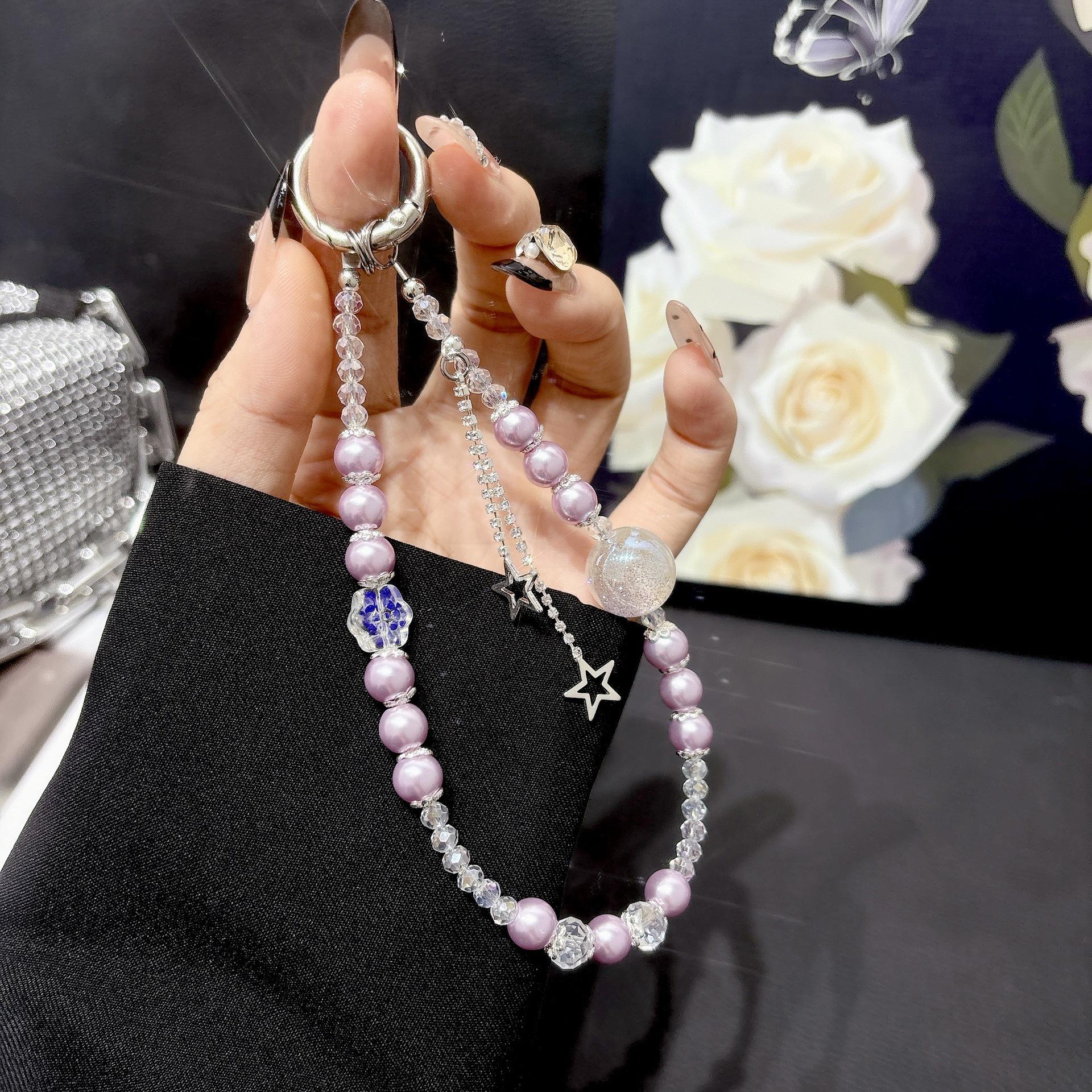 

Multicolor Pearl Crystal Phone Chain with Star Tassel Charm