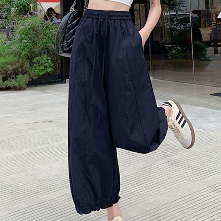 Women's Wide-Leg Ice Silk Pants: Dark Blue, Quick-Drying, High-Waist, Slimming, Lightweight Summer Lantern Style with Side Nine-Point Length.