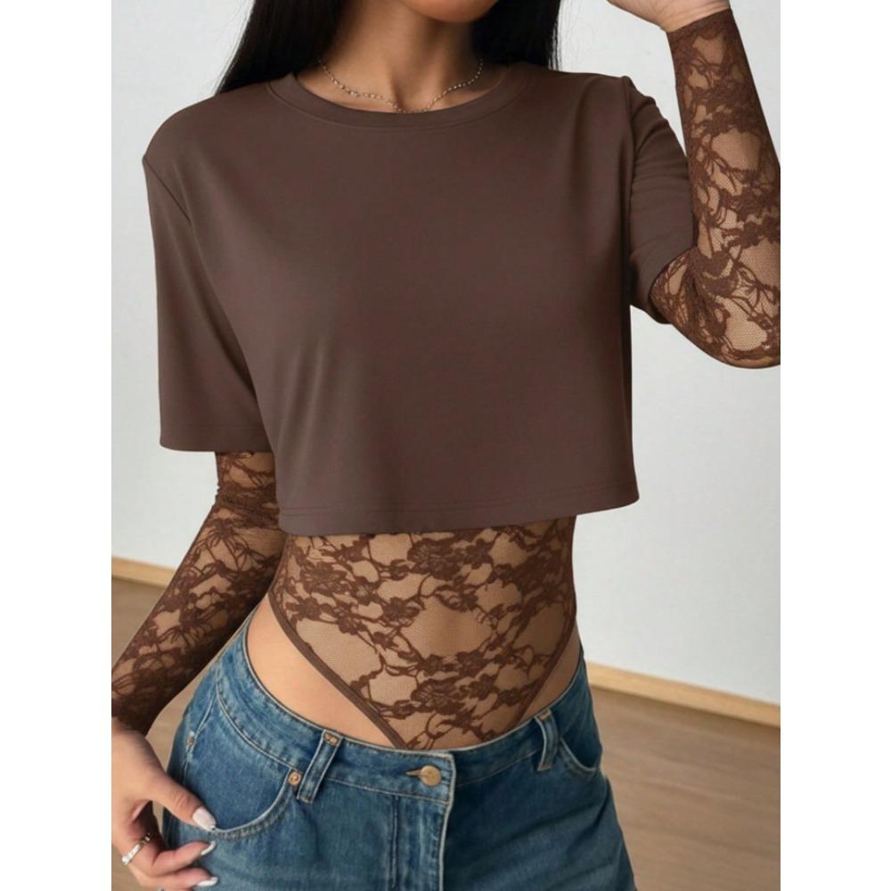 Modieuze en Elegante Eendelige Top in Effen Kleur met Korte Mouwen, Blote Buik en Nauwsluitend Ontwerp met Kantsteek.