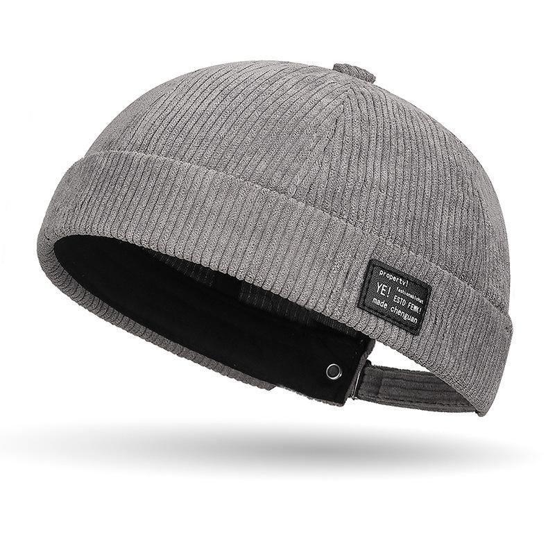 

Autumn and winter corduroy brimless casual hat, personalized yuppie hat, men s and women s striped velvet melon skin hat серый