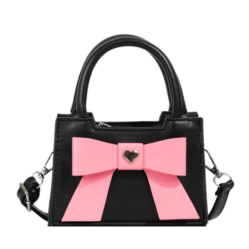 Stylish Korean Toddler Shoulder Bag For Kids Featuring Chic Color Block Design And Sweet Bow Detail