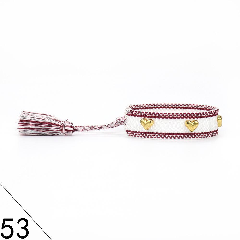 European and American Rivet Metal Heart Tassel Woven Bracelet for Women