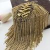 Designers of Fashion Nail Chains, DIY Epaulettes, and Beaded Clothing Styles