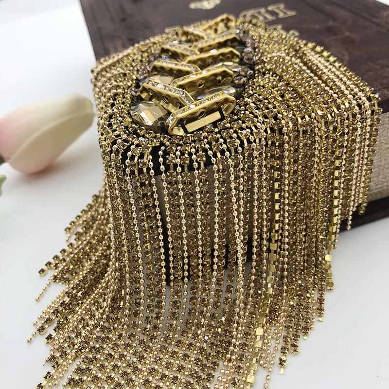 Designers of Fashion Nail Chains, DIY Epaulettes, and Beaded Clothing Styles