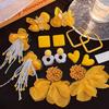 Super fairy yellow flower earrings 2025 new small fresh and sweet stud earrings light luxury temperament seaside vacation style earrings