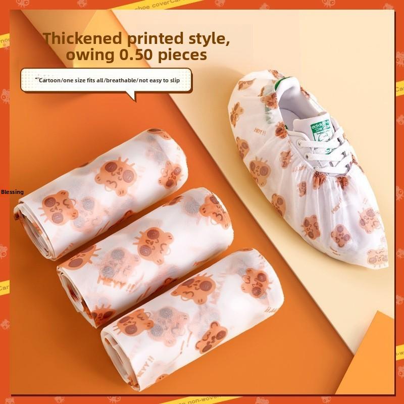 Одноразовые мультяшные утолщенные бытовые противоскользящие удобные износостойкие бахилы 1 pack of 50pcs