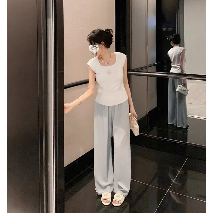 Hochwertige Xiaoxiangfeng Schultaschen-Schnalle Hausschuhe flacher Boden Ein-Wort-Slipper 2025 neu weiches Leder Rautenmuster Außenhausschuhe