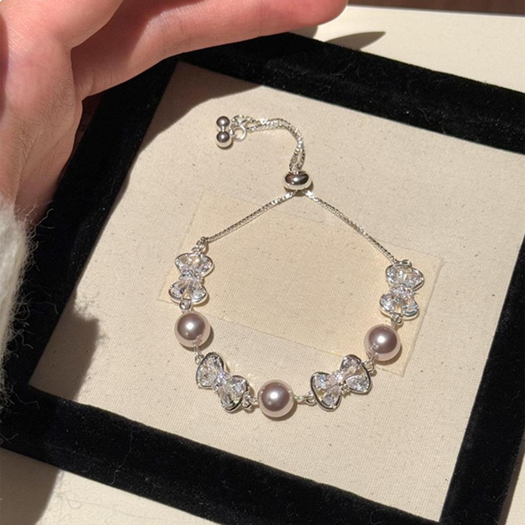 Zircon Bow Pearl Bracelet: Heart Light Collection - Fashionable, Versatile Wrist Accessory for Women